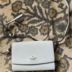 kate spade light blue leather crossbody bag with gold logo